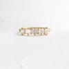 Sterling silver ring with a slim gold-plated band and pave stones