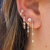 Loop earring featuring prong and bezel-set premium CZ diamonds