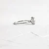 White sterling silver ring with a pave-set premium CZ stone