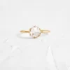 Sterling silver ring with a delicate rose basket setting