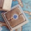 Gold-plated sterling silver ring with a polished halo setting