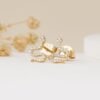 925 sterling silver snake studs with a modern curved motif