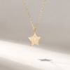 Tiny star pendant necklace with simple solitaire setting