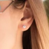 Gold-plated sterling silver diamond stud earrings with pave setting