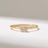 Clover ring featuring premium CZ diamonds and pave setting