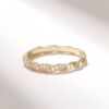 Twisted sterling silver ring with textured rope-like silhouette
