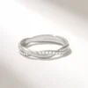 Sterling Silver wedding band with elegant flowing twist detail