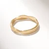 Twisted ring with Premium CZ Diamond accents and clean profile