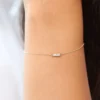 Elegant bracelet with refined double baguette detailing and sparkling CZ stones