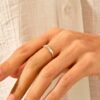 Silver wedding ring with slanted marquise stone row