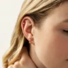 Sterling silver hoop earrings featuring a timeless retro-inspired design
