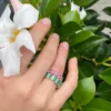 925 sterling silver eternity ring with emerald cut stones