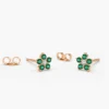 Stud earrings shaped like flowers with vivid green accents