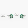 Emerald and diamond flower studs with a refined floral design