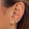 Pear-shaped green CZ stud earring in bezel setting