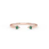 Emerald cuff ring in a refined, modern style