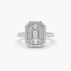 Silver engagement ring featuring 9 baguette-cut stones in halo design