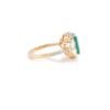 Gold-plated cocktail ring with a bold emerald centre stone