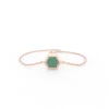 Minimalist bracelet featuring a green hexagon-cut CZ emerald stone