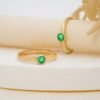 Small emerald huggies in 925 sterling silver and thick gold plating