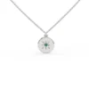 Celestial necklace featuring a star motif and emerald centre stone