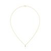 Elegant necklace featuring a classic prong set emerald stone