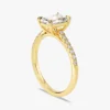 Platinum pave set ring with classic emerald-inspired accents