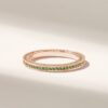 Delicate pave eternity ring with a classic emerald-inspired stone detail