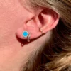 Turquoise stud earrings with premium CZ diamond detail