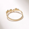 Daisy motif wedding ring with slender band profile