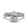Floral engagement ring with oval centre stone and prong setting