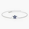 Bracelet with delicate flower motifs and a polished gold-plated look