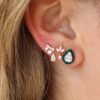 Pear-shaped stud earrings with CZ diamond accents