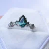 925 sterling silver ring with a pear-cut centre stone and thick gold plating