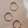 Versatile ring for stacking or wearing on its own