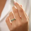 Ring showcasing 0.26 ct CZ diamonds and 0.75 ct emerald stones