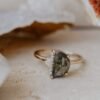 Half moon ring featuring a premium CZ diamond and pave setting