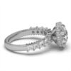 Halo diamond ring with princess and round stones surrounding the centre