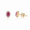 Oval ruby stud earrings with halo-set diamond details