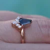 Distinctive kite shape ring with diamond detailing along the band