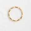 Latitude ring with balanced baguette stone design