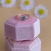 Leaf engagement ring with teal blue Montana sapphire look stone