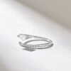 Bypass ring with a delicate open band silhouette
