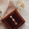 Sterling silver ring with kite-shaped diamond cluster design