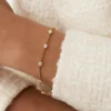 Polished sterling silver bracelet with clean infinity design