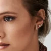 Gold plated mixed-shape stud earrings with a bold modern design