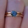 Solitaire engagement ring set featuring a Montana sapphire-inspired CZ stone
