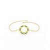 Open circle bracelet with elegant emerald stones