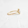Solitaire oval-cut CZ diamond ring with polished silver band
