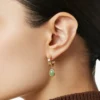 Bezel set jade earrings with polished silver hoops